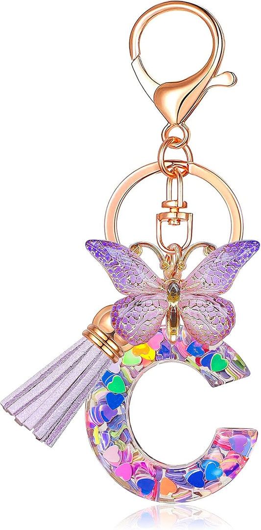 JINGUAZI Initial letter Keychains for Women Tassel Butterfly Pink Purple Cute Car Keychain for Wallet Backpack bag charm