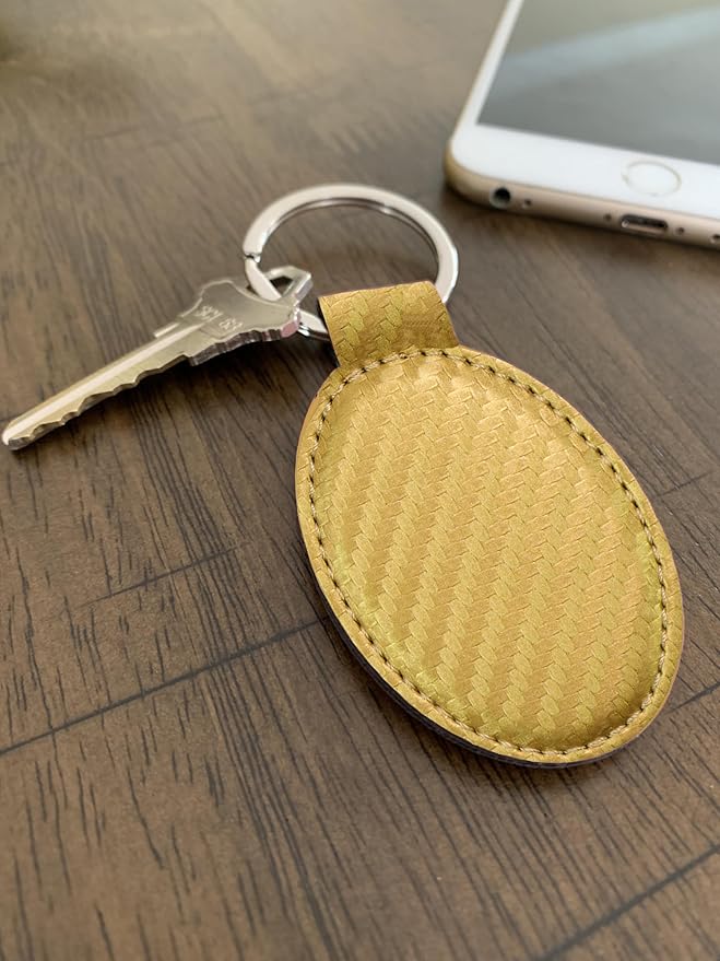 LaserGram Oval Keychain, Golfer Golfing, Personalized Engraving Included (Carbon Fiber Gold)
