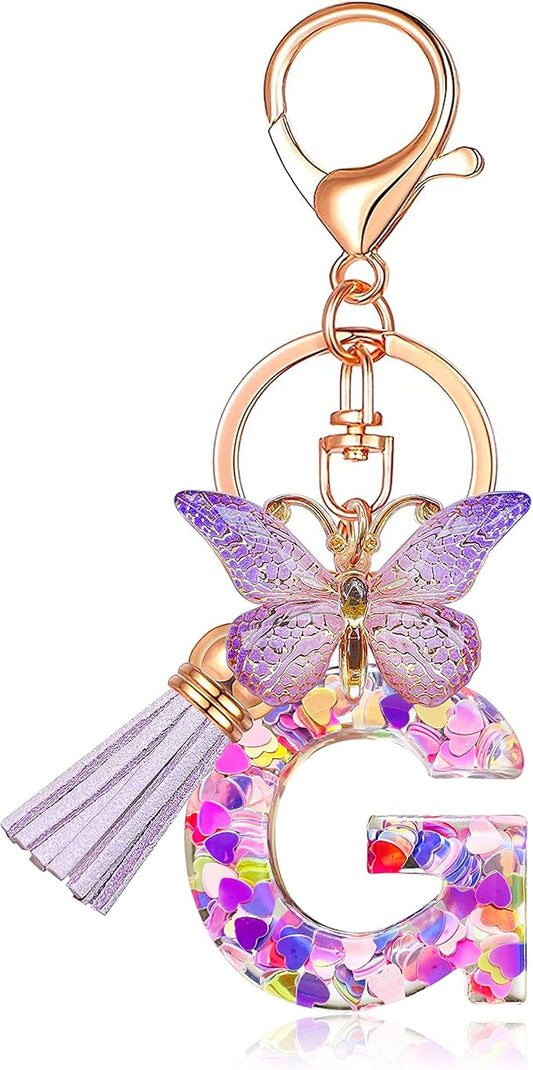 JINGUAZI Initial letter Keychains for Women Tassel Butterfly Pink Purple Cute Car Keychain for Wallet Backpack bag charm