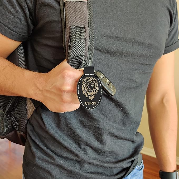 LaserGram Oval Keychain, Golfer Golfing, Personalized Engraving Included (Black with Gold)