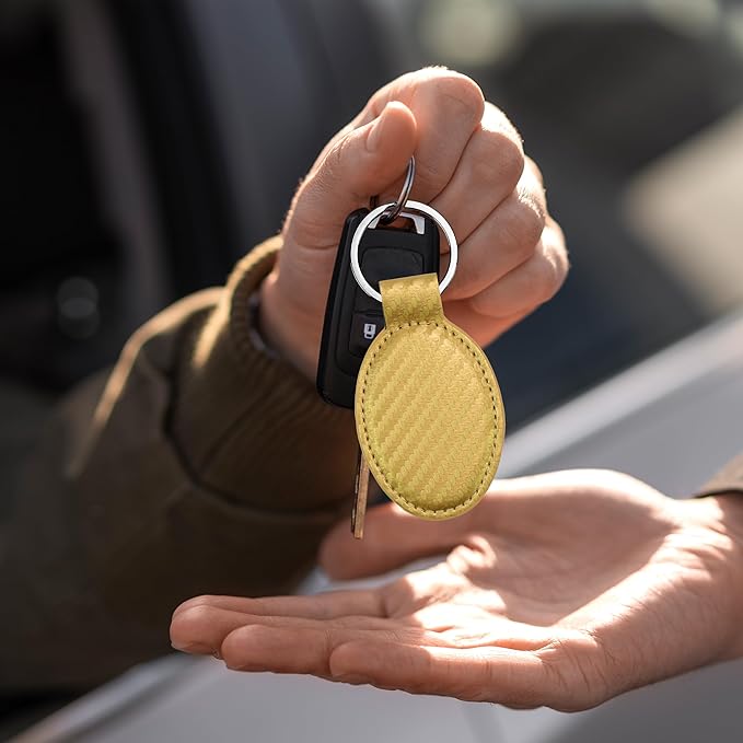 LaserGram Oval Keychain, Golfer Golfing, Personalized Engraving Included (Carbon Fiber Gold)