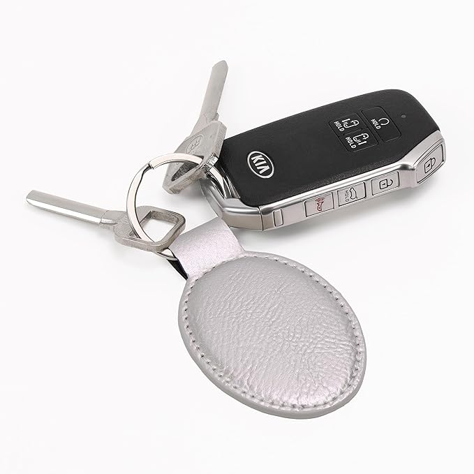 LaserGram Oval Keychain, Golfer Golfing, Personalized Engraving Included (Silver)
