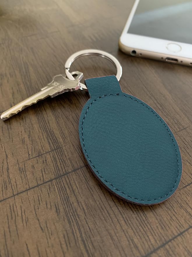 LaserGram Oval Keychain, Golfer Golfing, Personalized Engraving Included (Slate Blue)