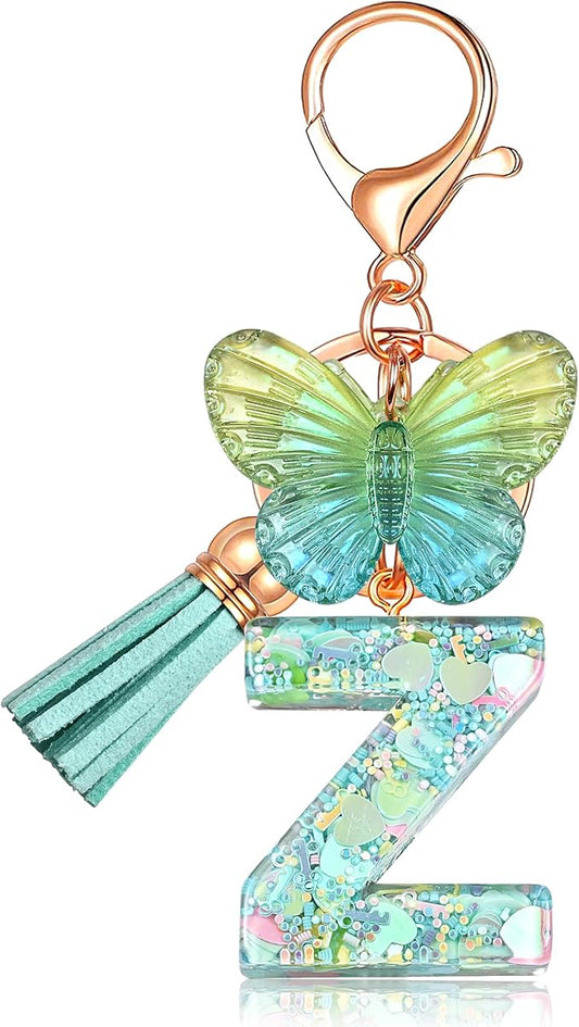 JINGUAZI Initial letter Keychains for Women Tassel Butterfly Pink Purple Cute Car Keychain for Wallet Backpack bag charm