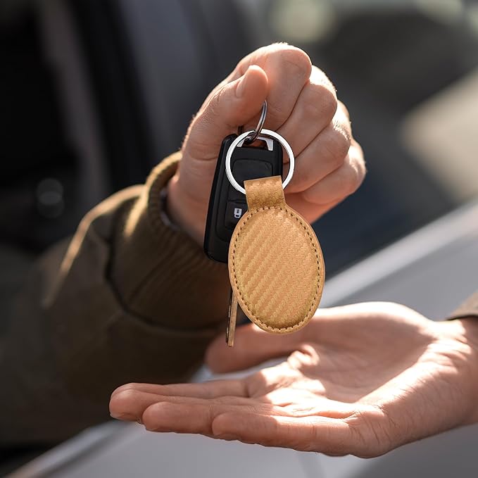 LaserGram Oval Keychain, Golfer Golfing, Personalized Engraving Included (Carbon Fiber Bronze)