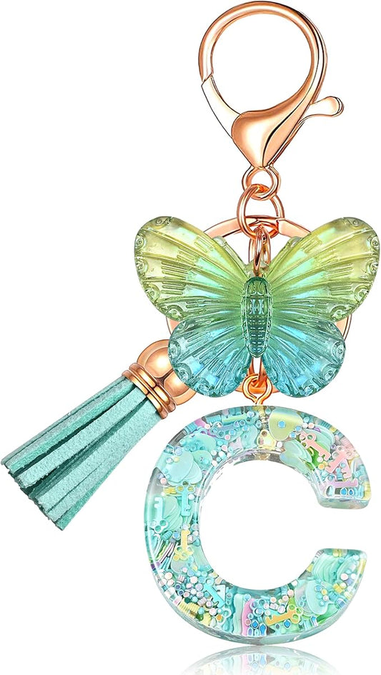 JINGUAZI Initial letter Keychains for Women Tassel Butterfly Pink Purple Cute Car Keychain for Wallet Backpack bag charm