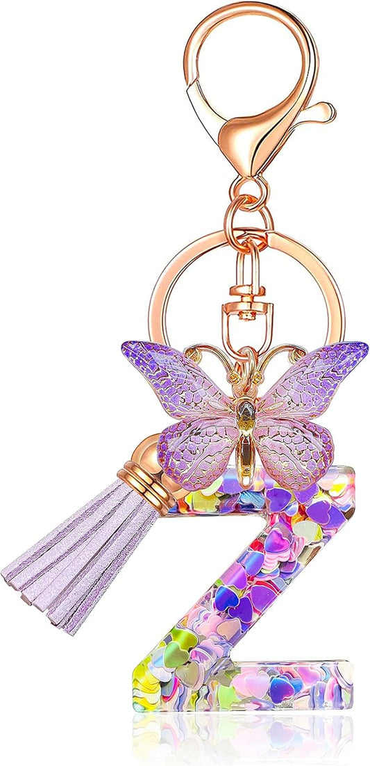 JINGUAZI Initial letter Keychains for Women Tassel Butterfly Pink Purple Cute Car Keychain for Wallet Backpack bag charm