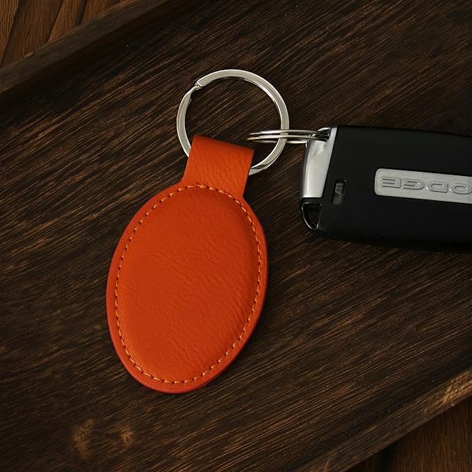 LaserGram Oval Keychain, Golfer Golfing, Personalized Engraving Included (Orange)