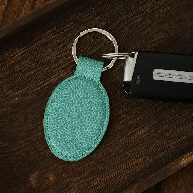LaserGram Oval Keychain, Golfer Golfing, Personalized Engraving Included (Basketball Teal)